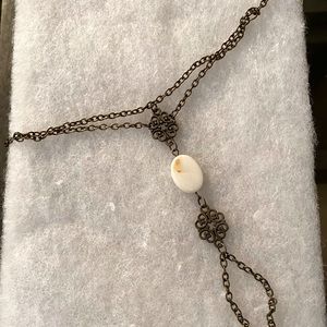 Bracelet that connects to your finger.